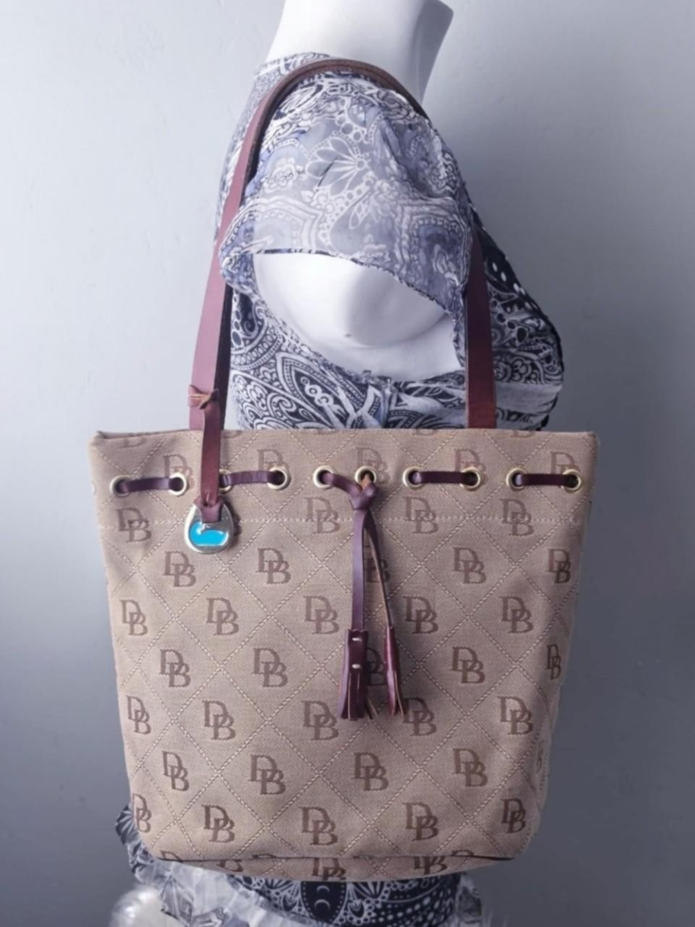 Vintage y2k Dooney & Bourke canvas bucket purse with leather handles
